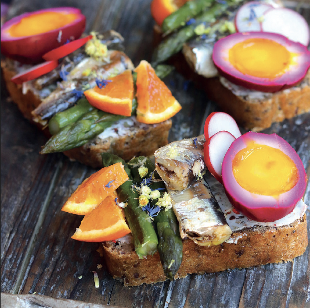 Smørrebrød with Pink Egg, Asparagus, and Small Sardines